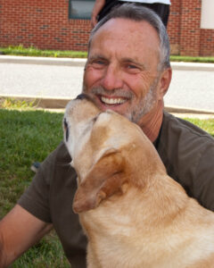 Brandywine CAD owner Jeff Applegate with his yellow lab Sam