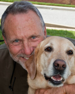 Brandywine CAD owner Jeff Applegate with his yellow lab Sam